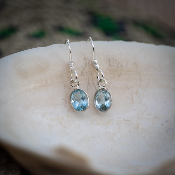 Oval Cut Blue Topaz Earrings