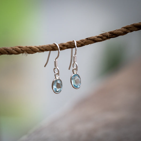 Oval Cut Blue Topaz Earrings