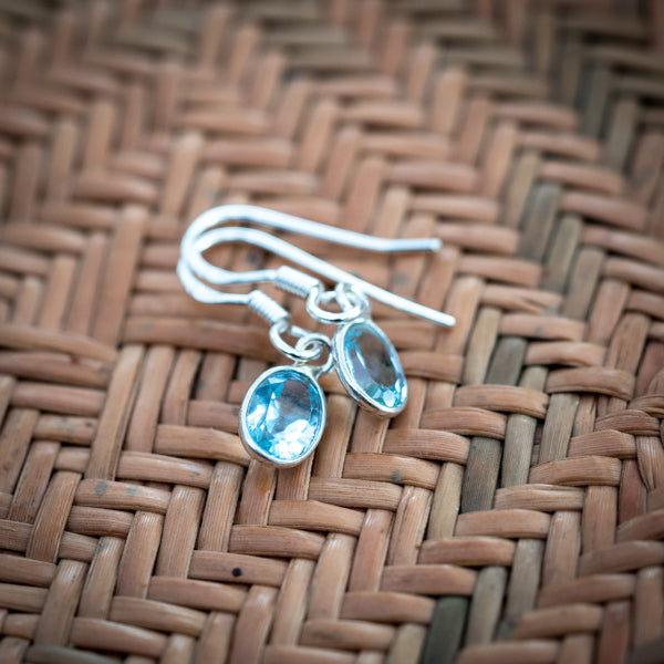 Oval Cut Blue Topaz Earrings
