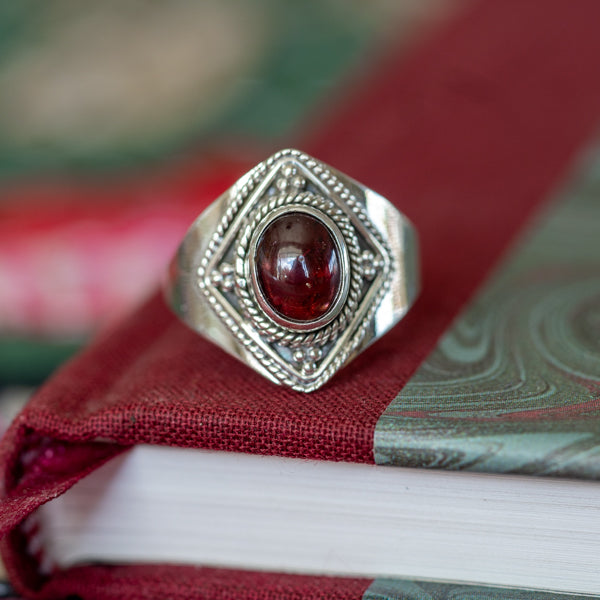 Stellar Garnet Ring